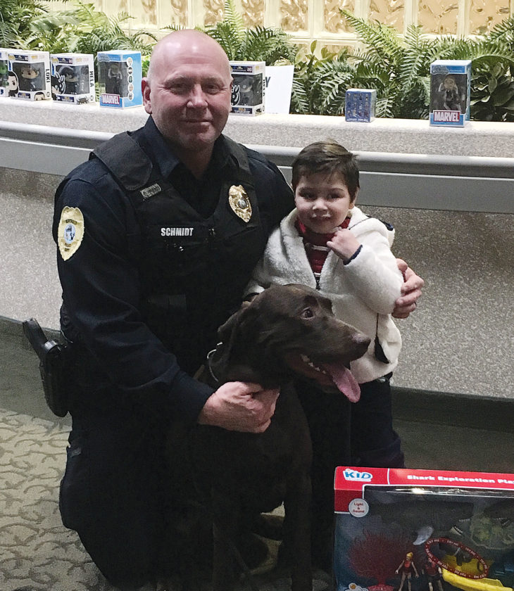 Berthold Police along with Trinity give holiday gifts News, Sports